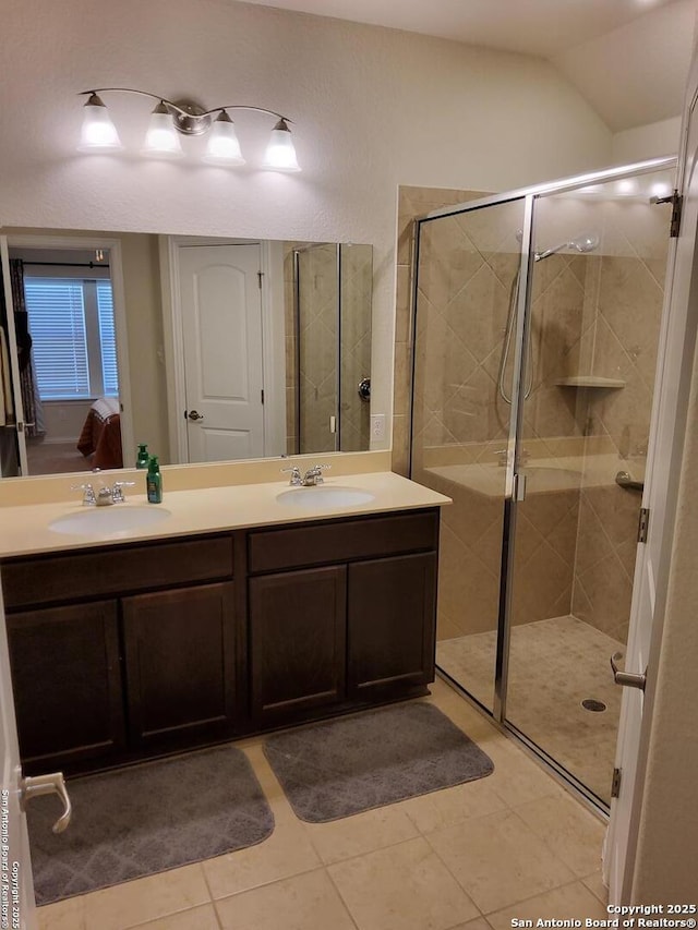 1976 Cowan Dr, New Braunfels, TX 78132 - ensuite bathroom with a shower stall, double vanity, and a sink