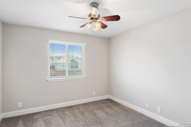 21950 Akin Byu, San Antonio, TX 78261 - spare room featuring baseboards, carpet, and a ceiling fan