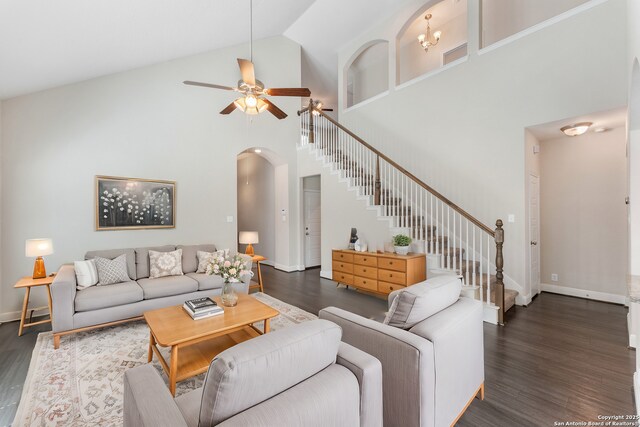 21950 Akin Byu, San Antonio, TX 78261 - living room featuring dark wood-type flooring, ceiling fan, and stairs