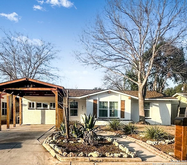 231 Cicero, San Antonio, TX 78218 - ranch-style house with stucco siding, concrete driveway, and a carport