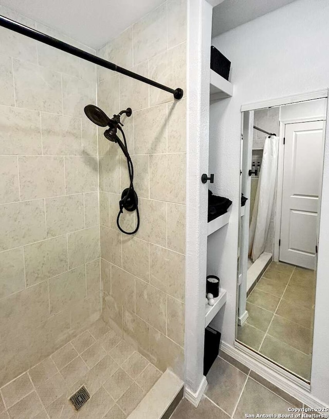 231 Cicero, San Antonio, TX 78218 - bathroom featuring a shower stall and tile patterned flooring