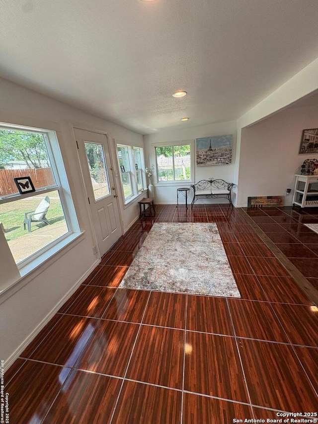 231 Cicero, San Antonio, TX 78218 - living area with recessed lighting, baseboards, and a textured ceiling