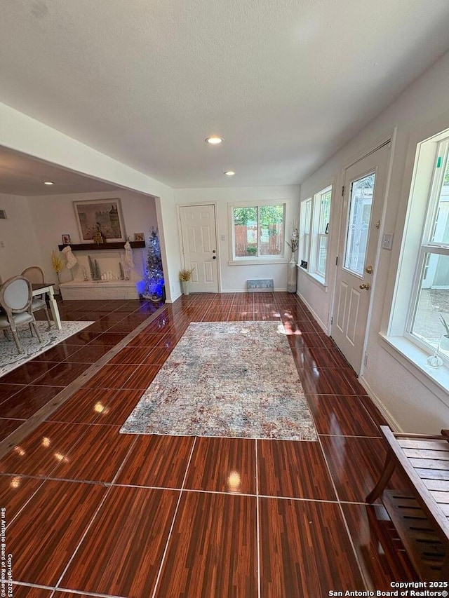 231 Cicero, San Antonio, TX 78218 - living room with recessed lighting, baseboards, and wood finished floors