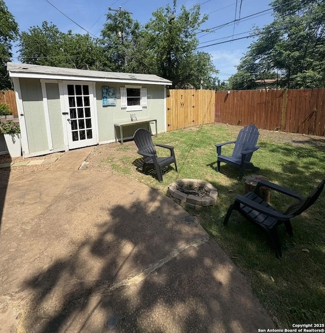 231 Cicero, San Antonio, TX 78218 - view of patio / terrace with an outdoor structure and a fire pit
