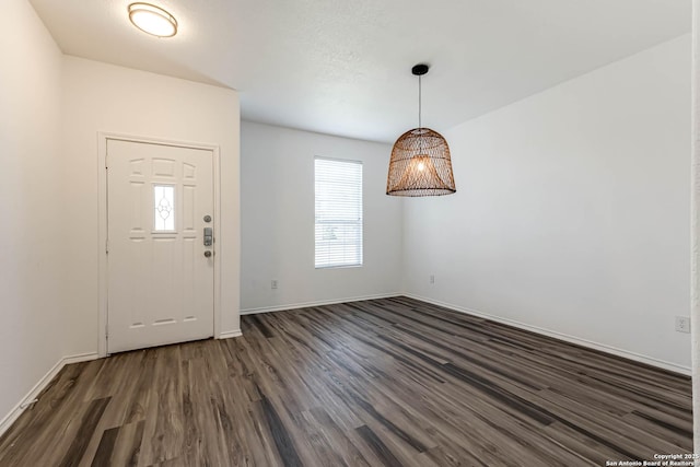 7519 Paraiso Hvn, Boerne, TX 78015 - foyer with dark wood-style floors and baseboards