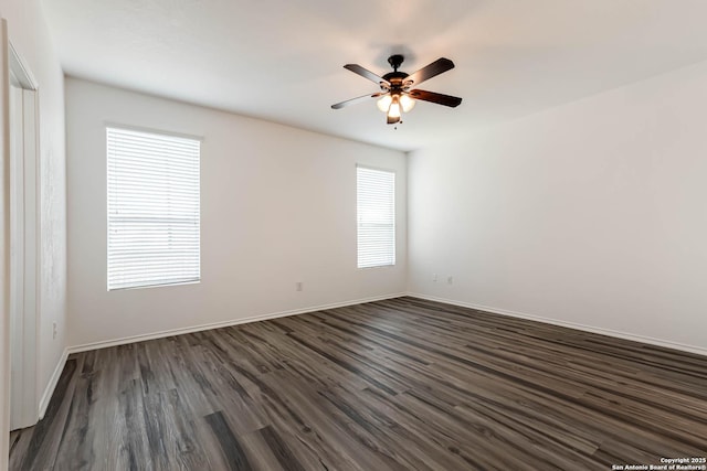 7519 Paraiso Hvn, Boerne, TX 78015 - unfurnished room with dark wood-style floors, baseboards, and a ceiling fan