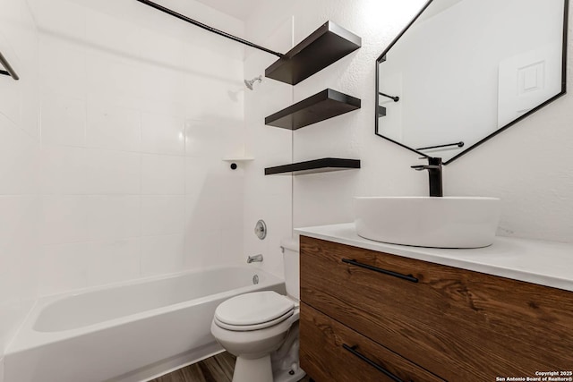 7519 Paraiso Hvn, Boerne, TX 78015 - bathroom featuring vanity,  shower combination, toilet, and wood finished floors