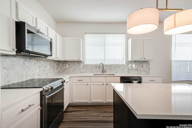 7519 Paraiso Hvn, Boerne, TX 78015 - kitchen featuring electric stove, a sink, tasteful backsplash, white cabinetry, and dishwashing machine
