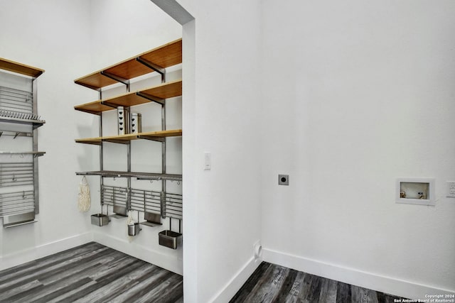 clothes washing area featuring baseboards, hookup for a washing machine, hookup for an electric dryer, and dark wood-style flooring
