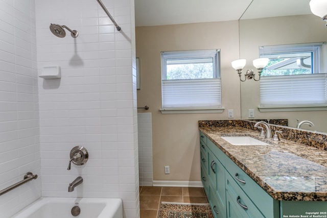 full bath featuring vanity, shower / bathing tub combination, baseboards, and tile patterned flooring