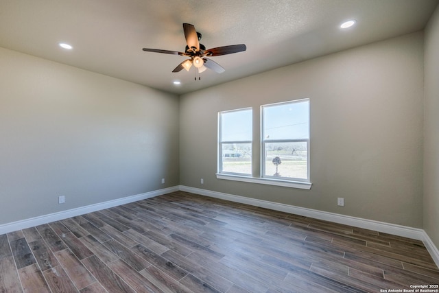 301 Honeysuckle Ln, Vernia, TX 78121 - empty room with dark wood-style floors, recessed lighting, baseboards, and ceiling fan