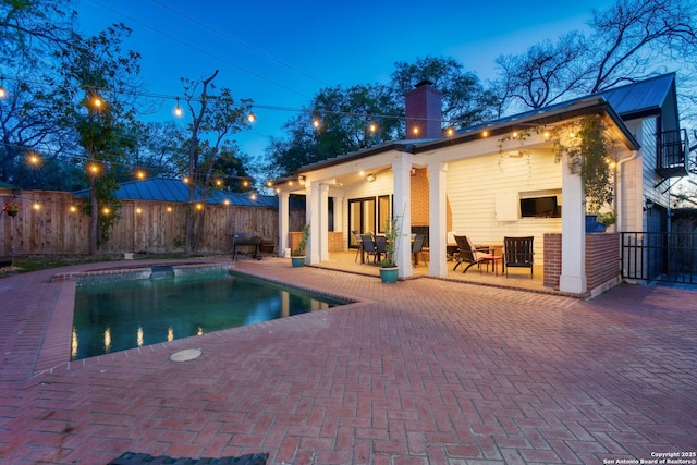 view of pool featuring a fenced in pool, a patio, and fence