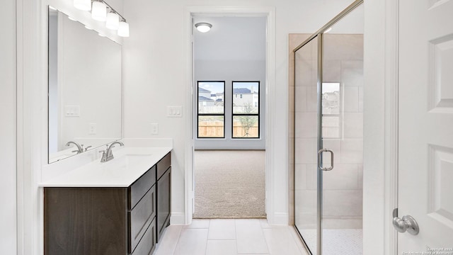 4971 Park Mnr, Schertz, TX 78124 - bathroom featuring a shower stall, tile patterned flooring, vanity, and baseboards