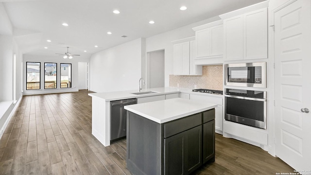 4971 Park Mnr, Schertz, TX 78124 - kitchen with stainless steel appliances, a sink, a center island, ceiling fan, and recessed lighting