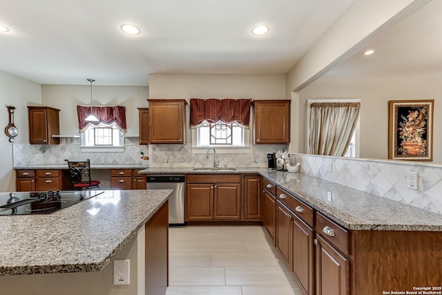 2106 W Gramercy Pl, San Antonio, TX 78201 - kitchen featuring dishwasher, a peninsula, tasteful backsplash, and a sink