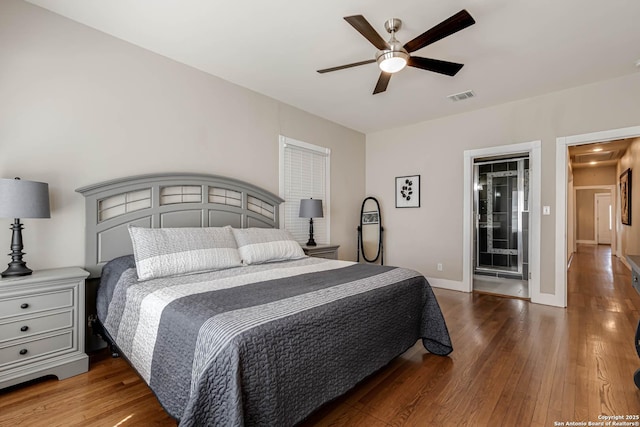 2106 W Gramercy Pl, San Antonio, TX 78201 - bedroom with visible vents, baseboards, a ceiling fan, and hardwood / wood-style flooring