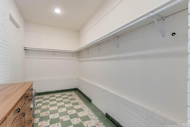 2106 W Gramercy Pl, San Antonio, TX 78201 - walk in closet featuring tile patterned floors