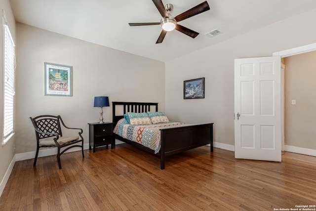 2106 W Gramercy Pl, San Antonio, TX 78201 - bedroom with vaulted ceiling, wood finished floors, visible vents, and baseboards