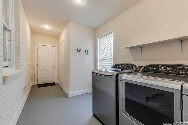 2106 W Gramercy Pl, San Antonio, TX 78201 - clothes washing area featuring laundry area, baseboards, and separate washer and dryer