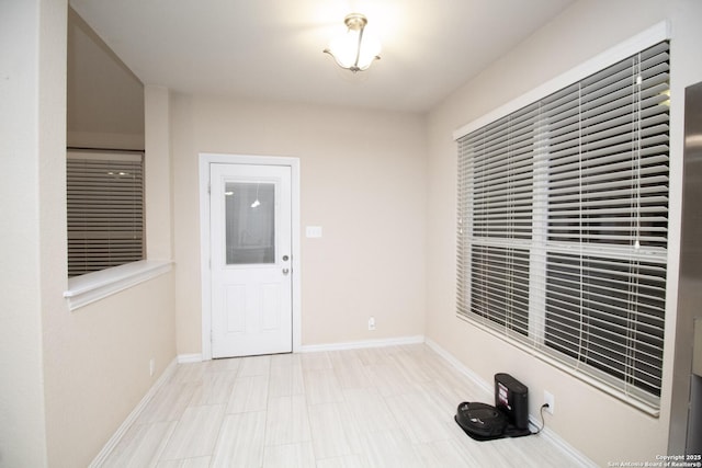 entrance foyer with baseboards