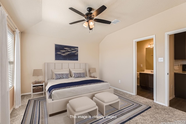 2066 Chelsea, New Braunfels, TX 78130 - bedroom with visible vents, lofted ceiling, baseboards, and ensuite bath