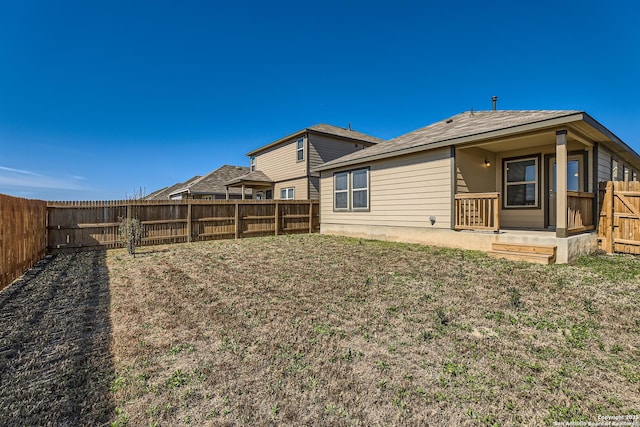 2066 Chelsea, New Braunfels, TX 78130 - rear view of property featuring a yard and a fenced backyard