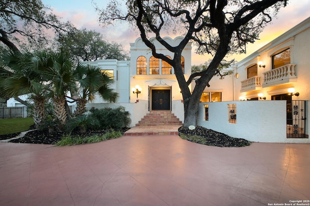 12703 Old Wick, San Antonio, TX 78230 - view of front of property with fence and stucco siding