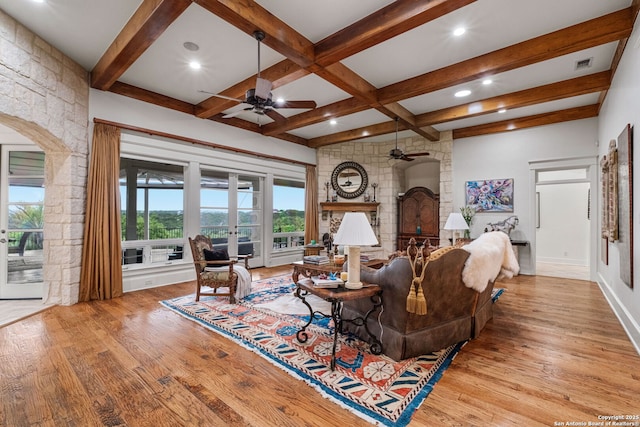 1626 Cordillera Trce, Boerne, TX 78006 - living room featuring a ceiling fan, wood finished floors, visible vents, and beam ceiling