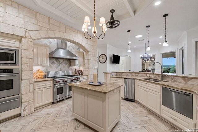 1626 Cordillera Trce, Boerne, TX 78006 - kitchen with a sink, a chandelier, a warming drawer, wall chimney exhaust hood, and appliances with stainless steel finishes