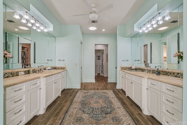 1626 Cordillera Trce, Boerne, TX 78006 - full bath with visible vents, wood finished floors, a sink, and ceiling fan