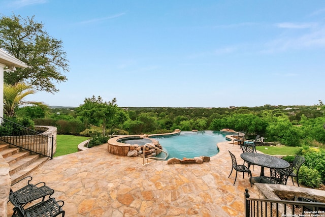1626 Cordillera Trce, Boerne, TX 78006 - view of pool with stairway, a wooded view, a pool with connected hot tub, and a patio