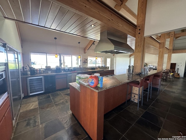 kitchen featuring dishwasher, extractor fan, a wealth of natural light, and beam ceiling