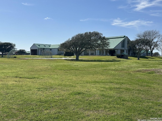 view of yard featuring a garage