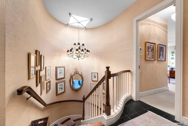 122 Chester Apt 5, San Antonio, TX 78209 - stairs featuring a chandelier and tile patterned flooring