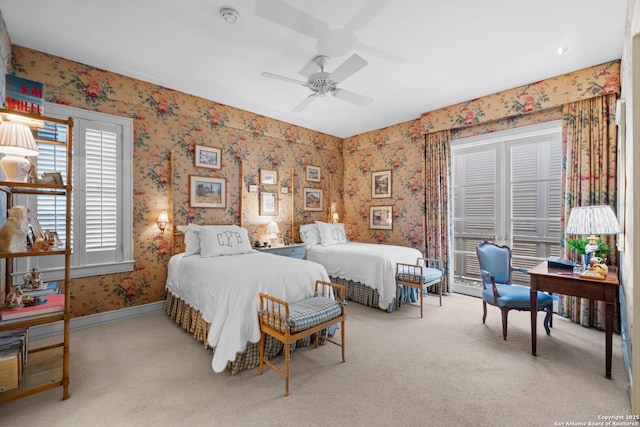 122 Chester Apt 5, San Antonio, TX 78209 - bedroom featuring carpet, wallpapered walls, and ceiling fan
