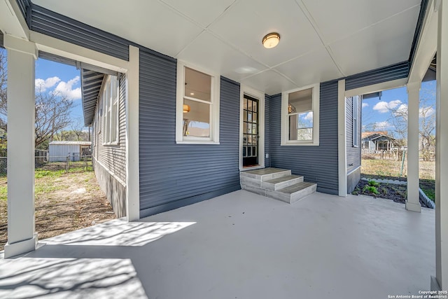 view of patio / terrace featuring fence