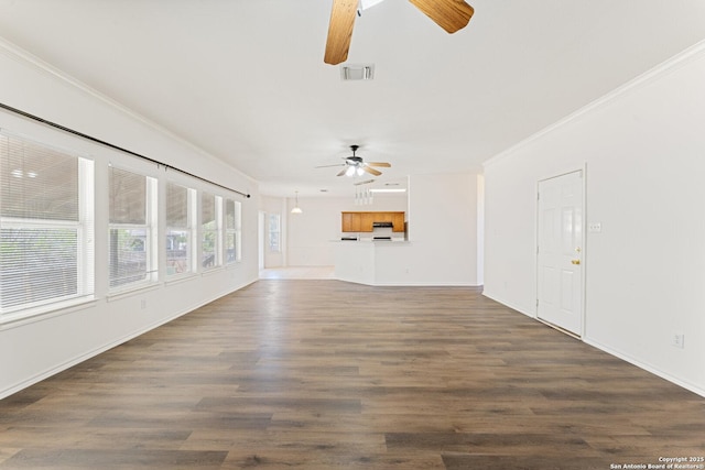 12319 Stable Road Dr, San Antonio, TX 78249 - unfurnished living room with wood finished floors, baseboards, visible vents, ceiling fan, and crown molding
