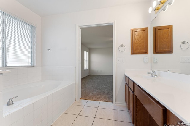 12319 Stable Road Dr, San Antonio, TX 78249 - bathroom featuring tile patterned floors, a wealth of natural light, vanity, and a bath