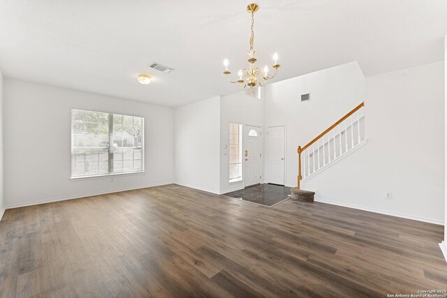 12319 Stable Road Dr, San Antonio, TX 78249 - foyer with visible vents, a notable chandelier, dark wood-style floors, and stairs
