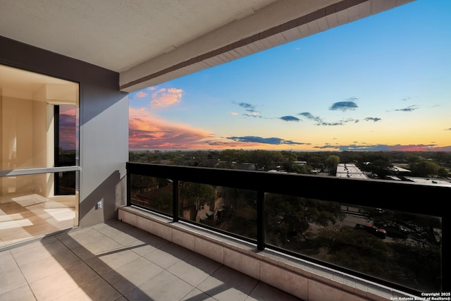 7887 Broadway Unit 707, San Antonio, TX 78209 - view of balcony at dusk