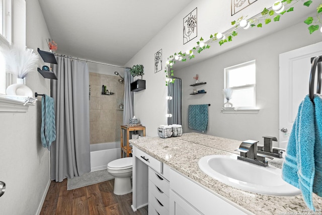 923 Empress Brilliant, San Antonio, TX 78253 - bathroom featuring vanity, toilet, wood finished floors, and shower / tub combo with curtain