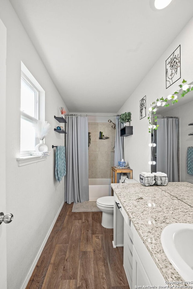 923 Empress Brilliant, San Antonio, TX 78253 - full bath featuring vanity, wood finished floors, baseboards, shower / bath combo, and toilet