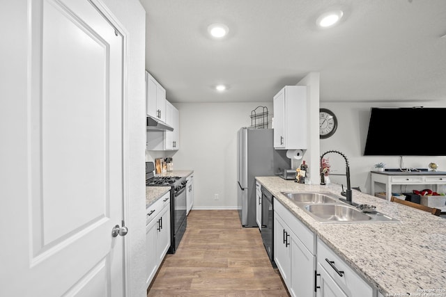 923 Empress Brilliant, San Antonio, TX 78253 - kitchen featuring black appliances, under cabinet range hood, light wood-style floors, white cabinetry, and a sink