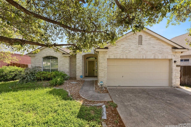 14204 Auberry, Helotes, TX 78023 - view of front of house with concrete driveway, a garage, and brick siding
