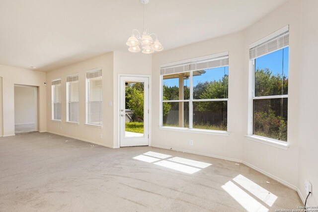 14204 Auberry, Helotes, TX 78023 - spare room with a chandelier, carpet, and baseboards