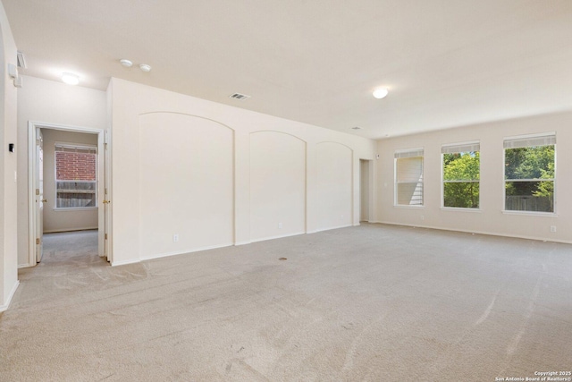 14204 Auberry, Helotes, TX 78023 - unfurnished bedroom with light colored carpet and baseboards