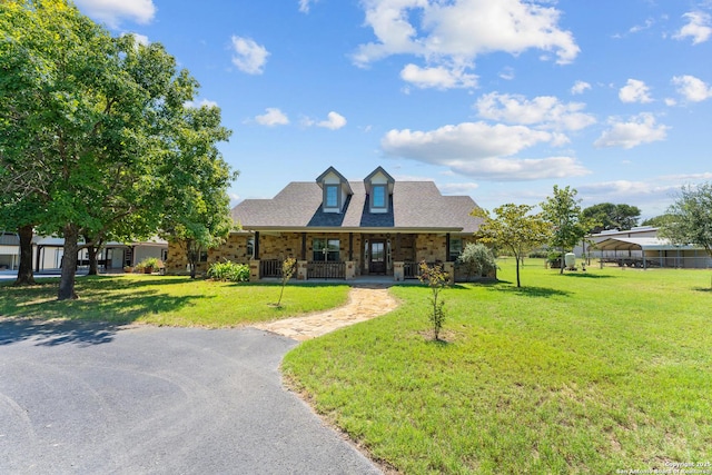 104 Woodcreek Ln, Vernia, TX 78121 - view of front of property with a carport, covered porch, a shingled roof, and a front lawn