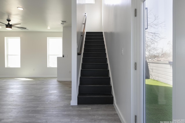 106 Bank St Unit 201, San Antonio, TX 78204 - staircase with visible vents, baseboards, ceiling fan, and wood finished floors