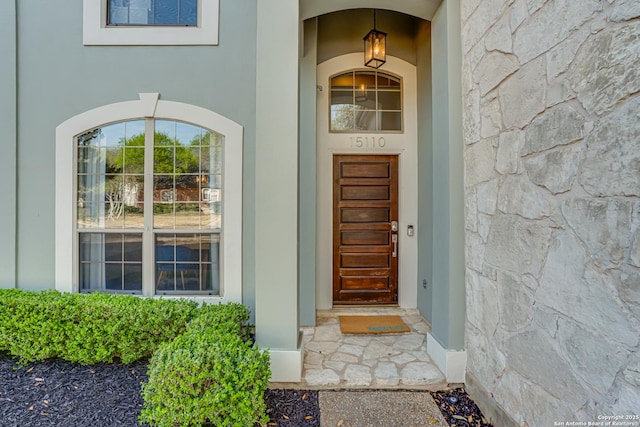 15110 Grayoak Frst, San Antonio, TX 78248 - doorway to property with stone siding and stucco siding