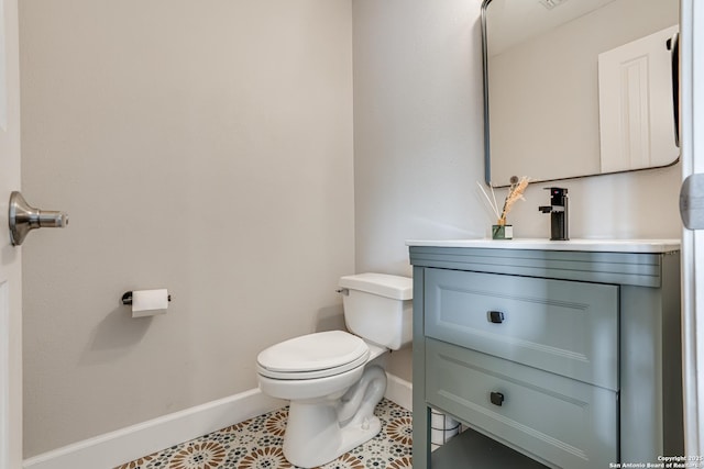 15110 Grayoak Frst, San Antonio, TX 78248 - bathroom with tile patterned floors, toilet, vanity, and baseboards